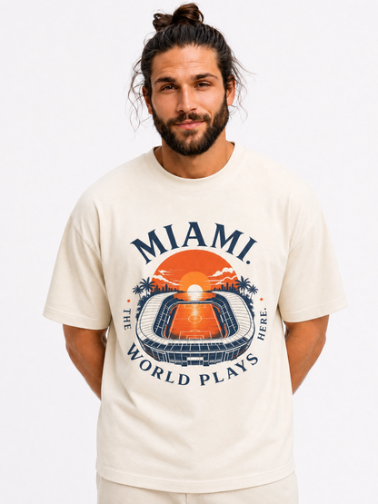 Miami Sunset Stadium T-Shirt — "The World Plays Here" Vintage Beach Graphic